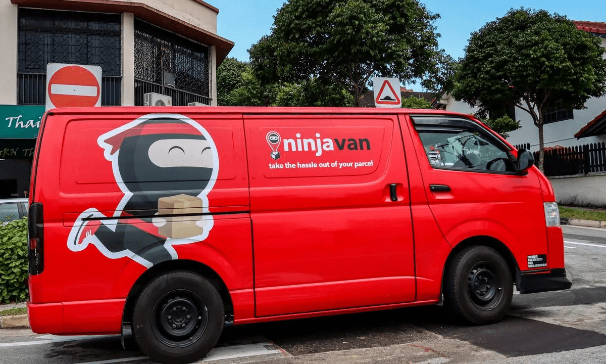 Red Ninja Van delivery vehicle with branded courier artwork
